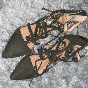 Strappy green flats